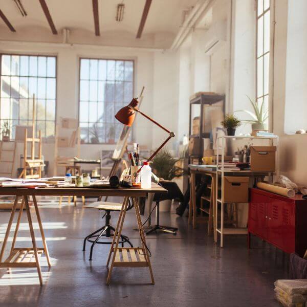 Creative art studio with durable epoxy flooring, ideal for paint work, tools and easy cleaning. Installed by Epoxy Flooring Guys Sydney.