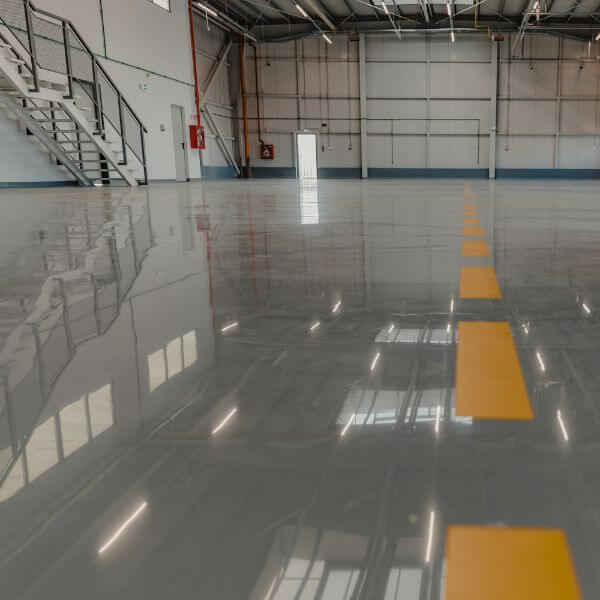 Industrial epoxy flooring by Epoxy Flooring Guys Sydney, ideal for factories, warehouses and transport hubs needing safe, low-maintenance floors.